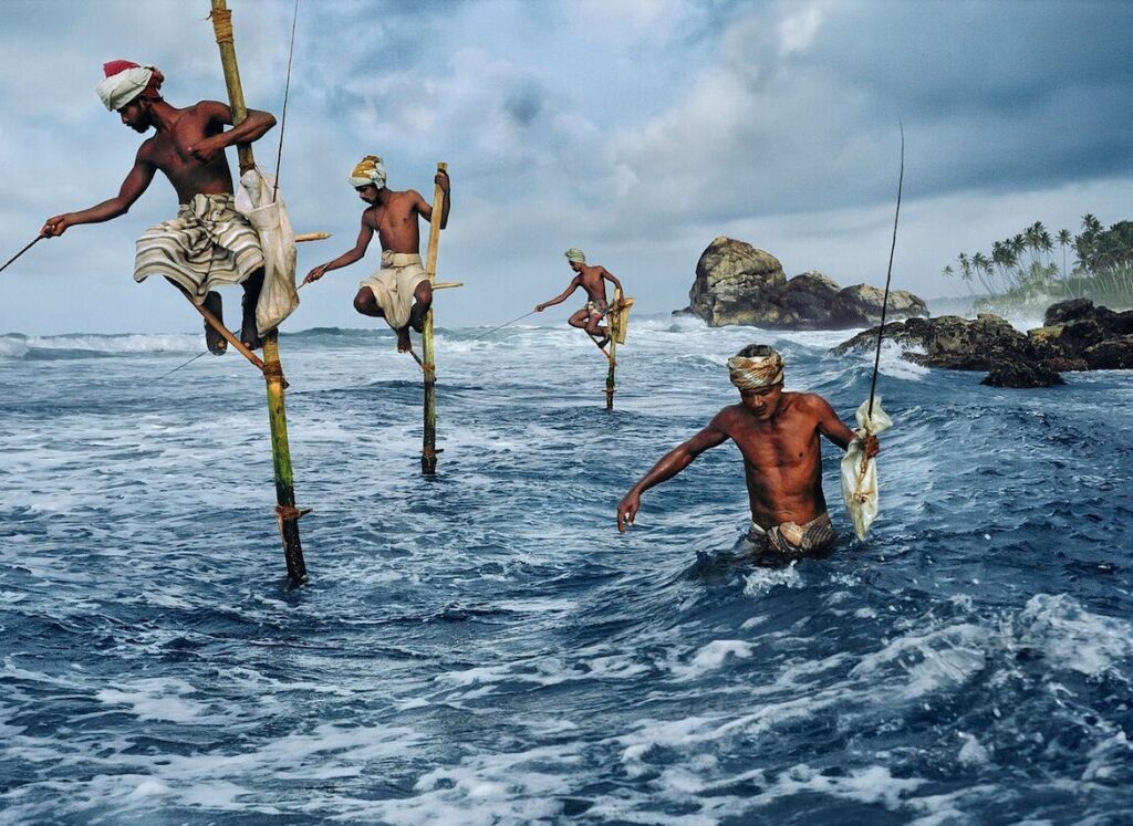 Men stilt fishing in Sri Lanka.